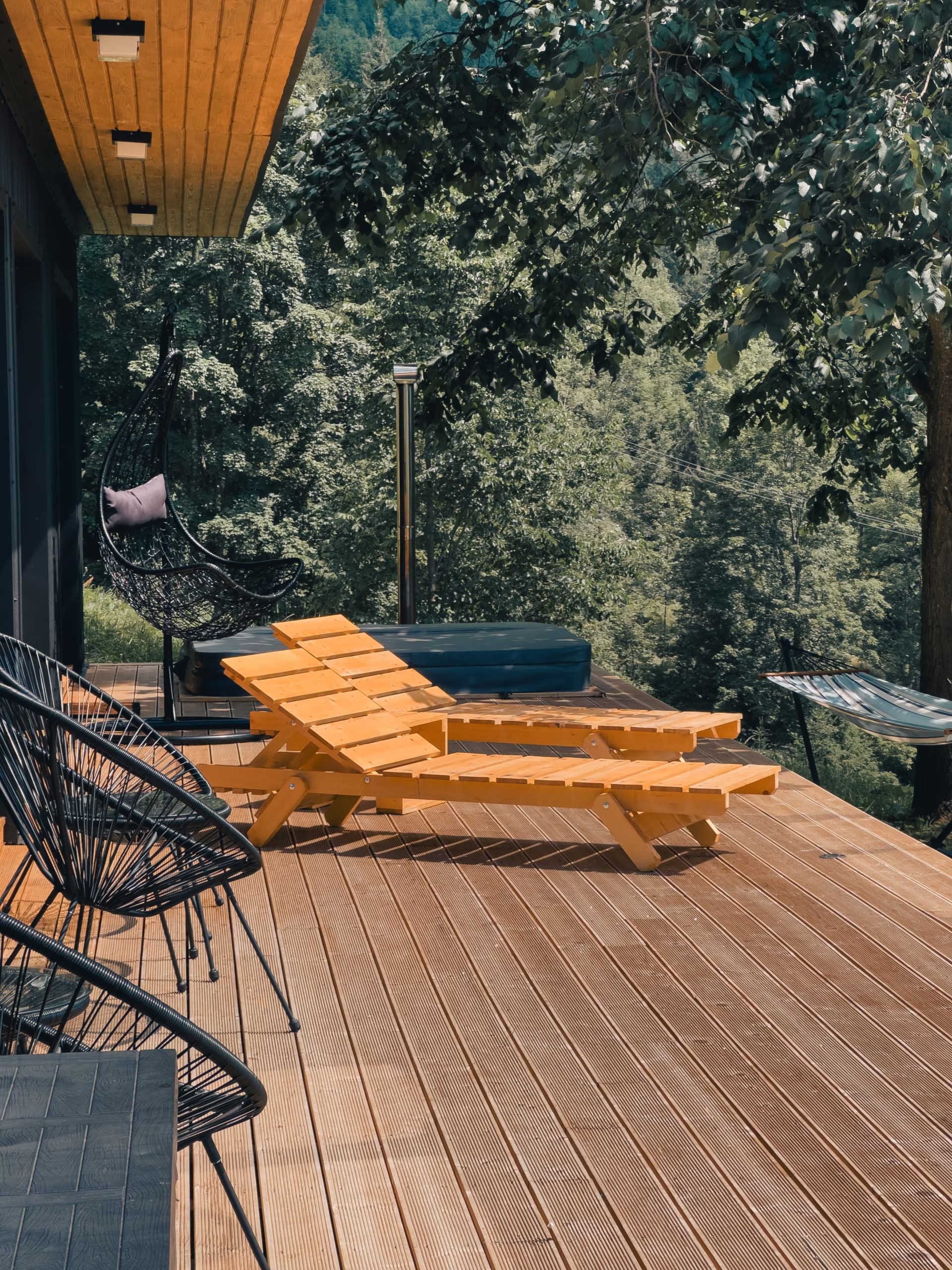 Composite decking installed on a modern outdoor living space, illustrating low-maintenance decking materials designed for durability and everyday use.