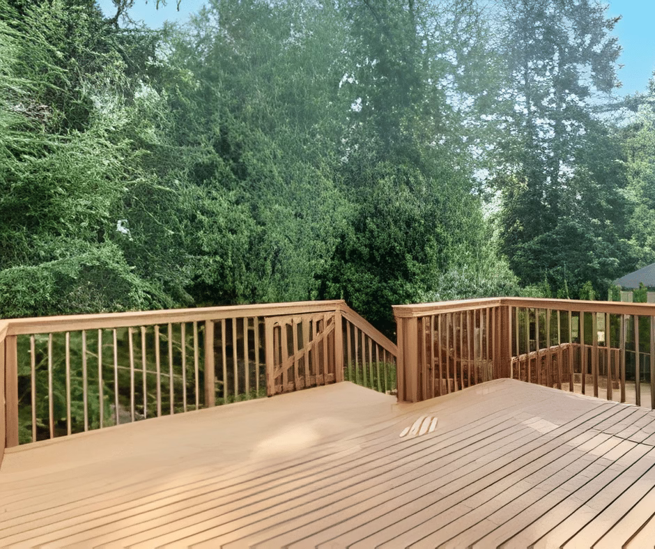 Elevated backyard deck with perimeter railing highlighting structural layout and spacing that a deck builder must get right to prevent deck construction mistakes and long-term failure