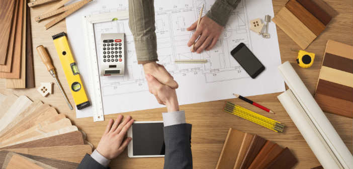 Business handshake of two men closing a deal - remodeling general contractor