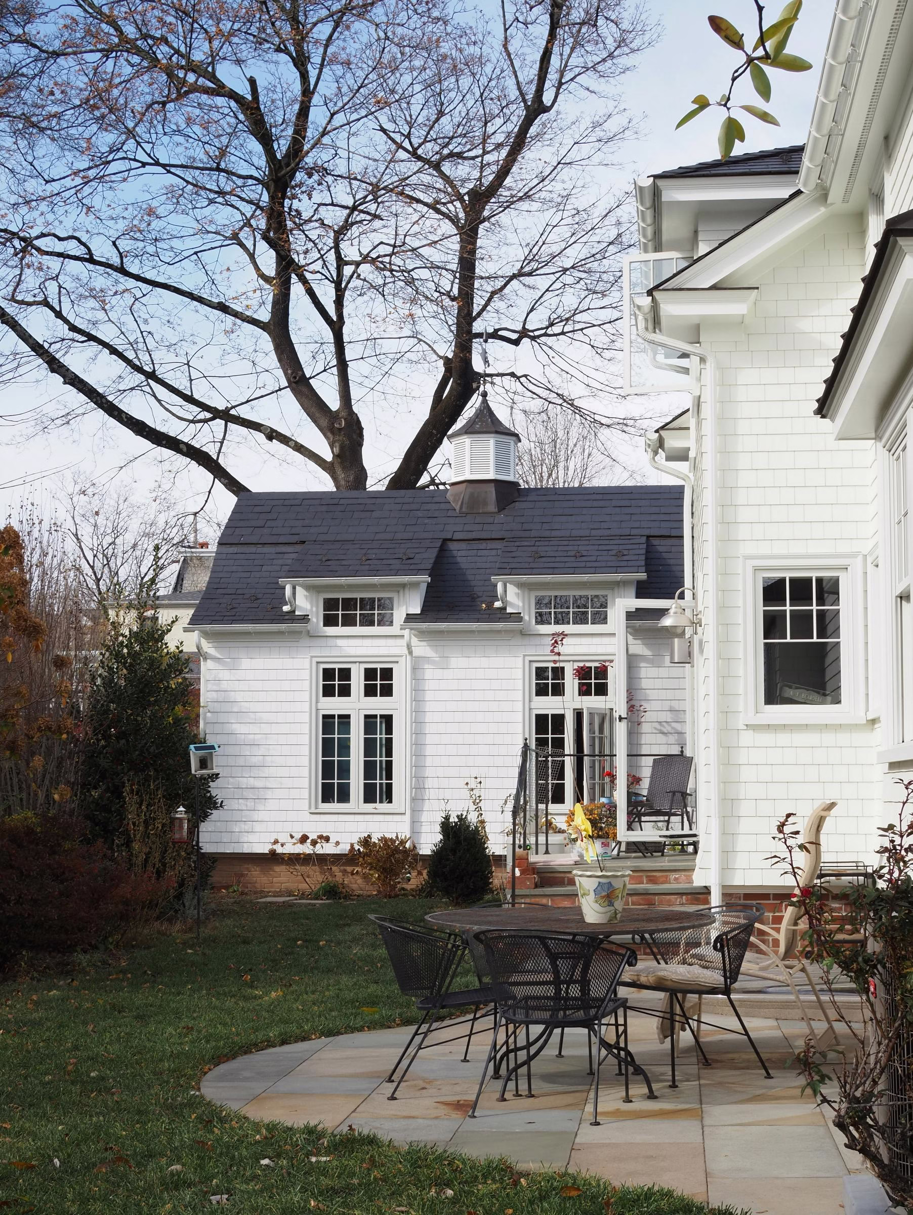 Rear home addition seamlessly integrated into existing structure illustrating how home addition ROI depends on design cohesion