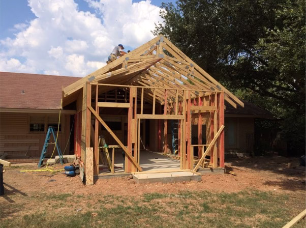 home addition considerations illustrated during framing of a residential addition connecting to an existing structure