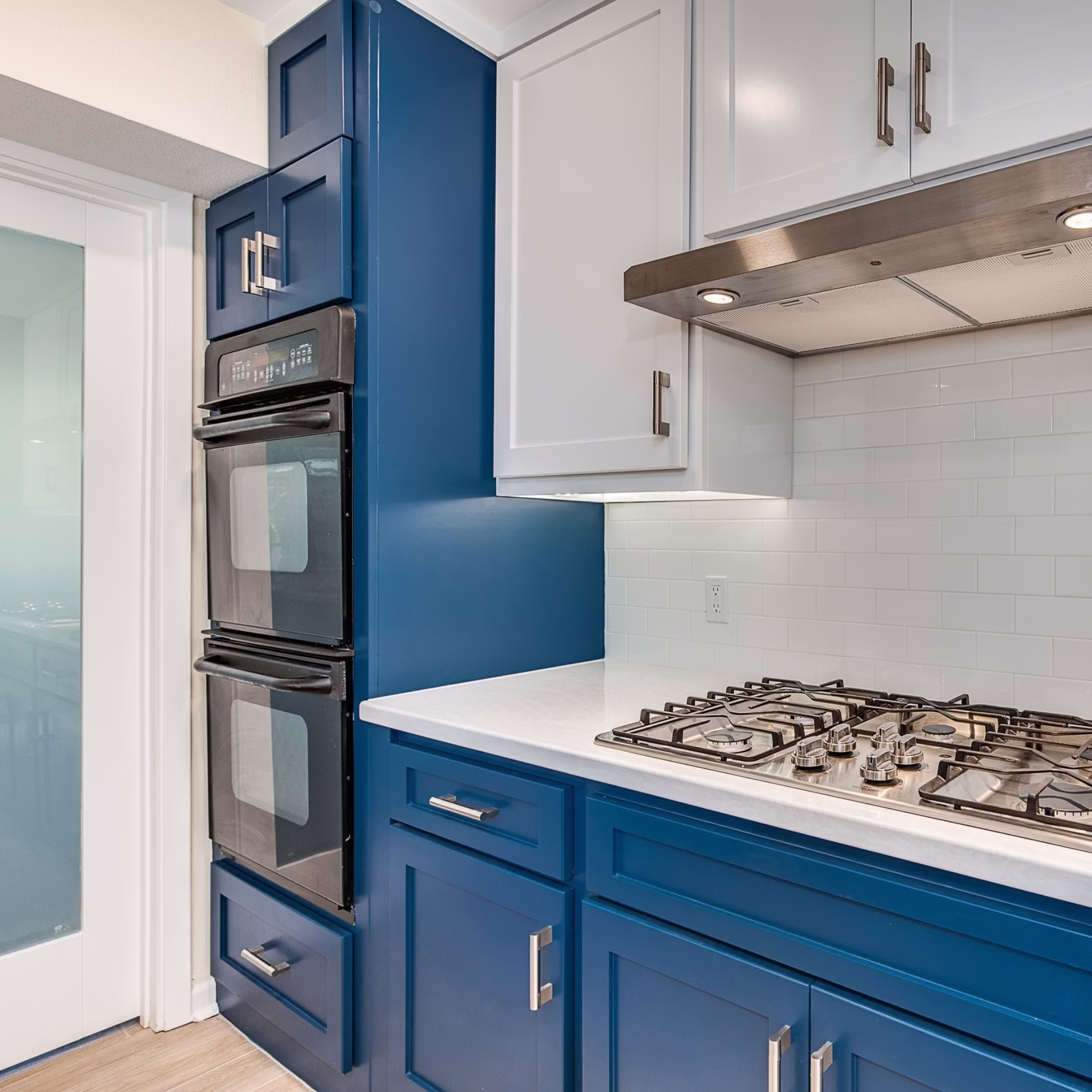 Glass-panel laundry room door added during the kitchen remodel to allow more light into the adjoining space.