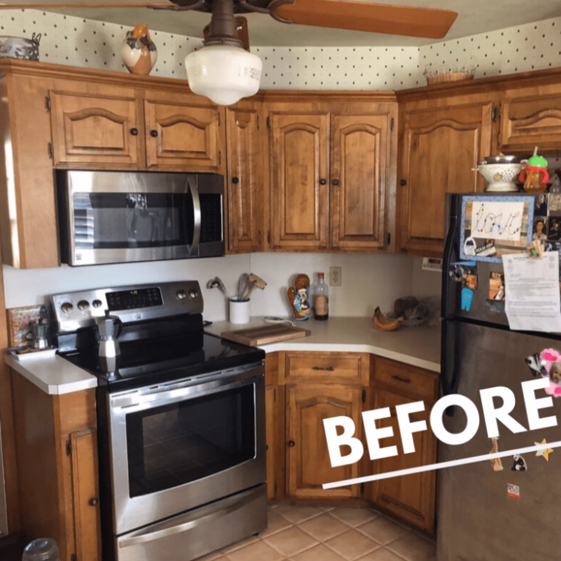 Original farmhouse-style kitchen with natural wood cabinets, an electric range, over-the-range microwave, and corner countertops.