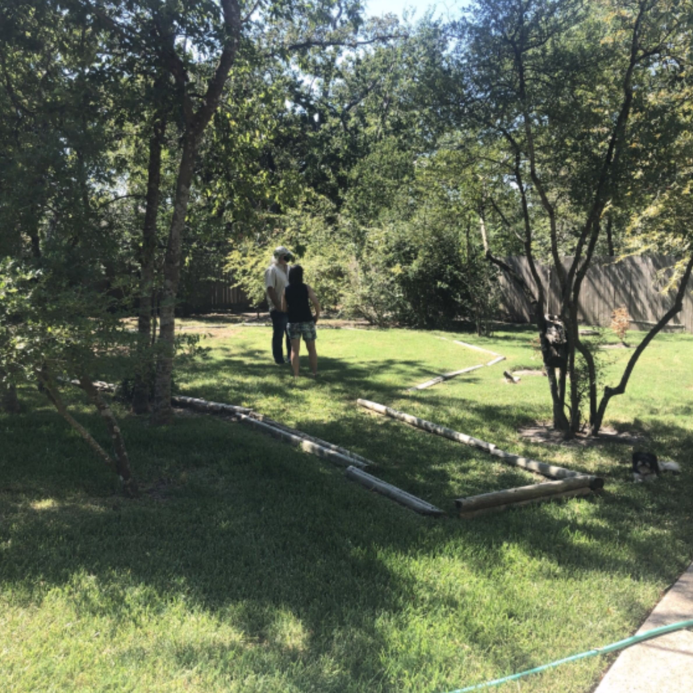 Backyard site being evaluated for a detached home office addition in Bryan-College Station.