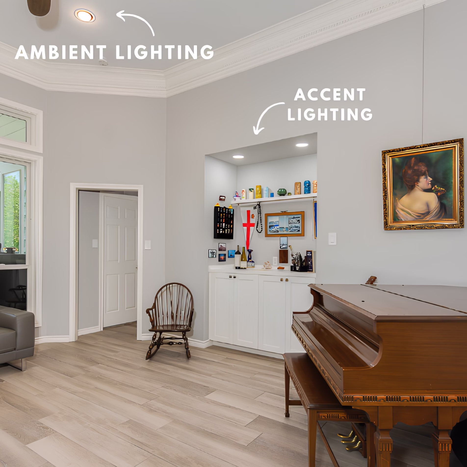 Living area with a recessed ceiling light providing ambient illumination and two accent lights illuminating a built-in display alcove beside a piano.