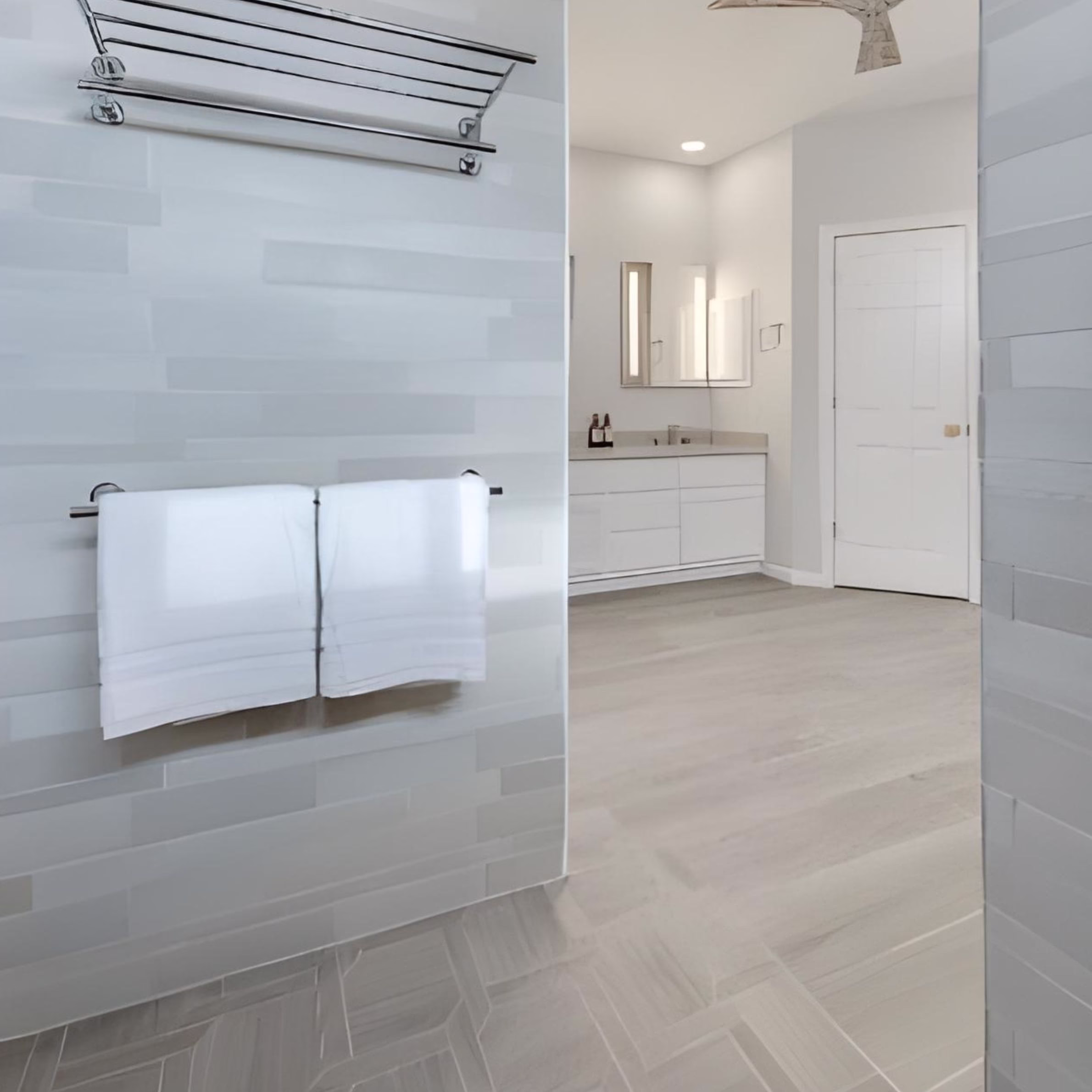Bathroom with continuous tile flooring and open sightlines, highlighting space saving bathroom design and how to make a small bathroom feel bigger through flooring choices.