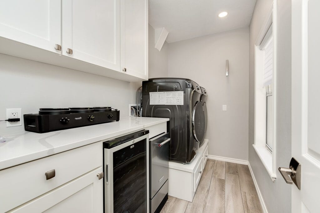 Laundry room remodel with pull out storage
