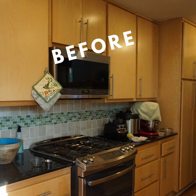 before kitchen from a kitchen and bathroom remodel College Station with dark countertops, green mosaic backsplash, and original cabinetry at the stove wall