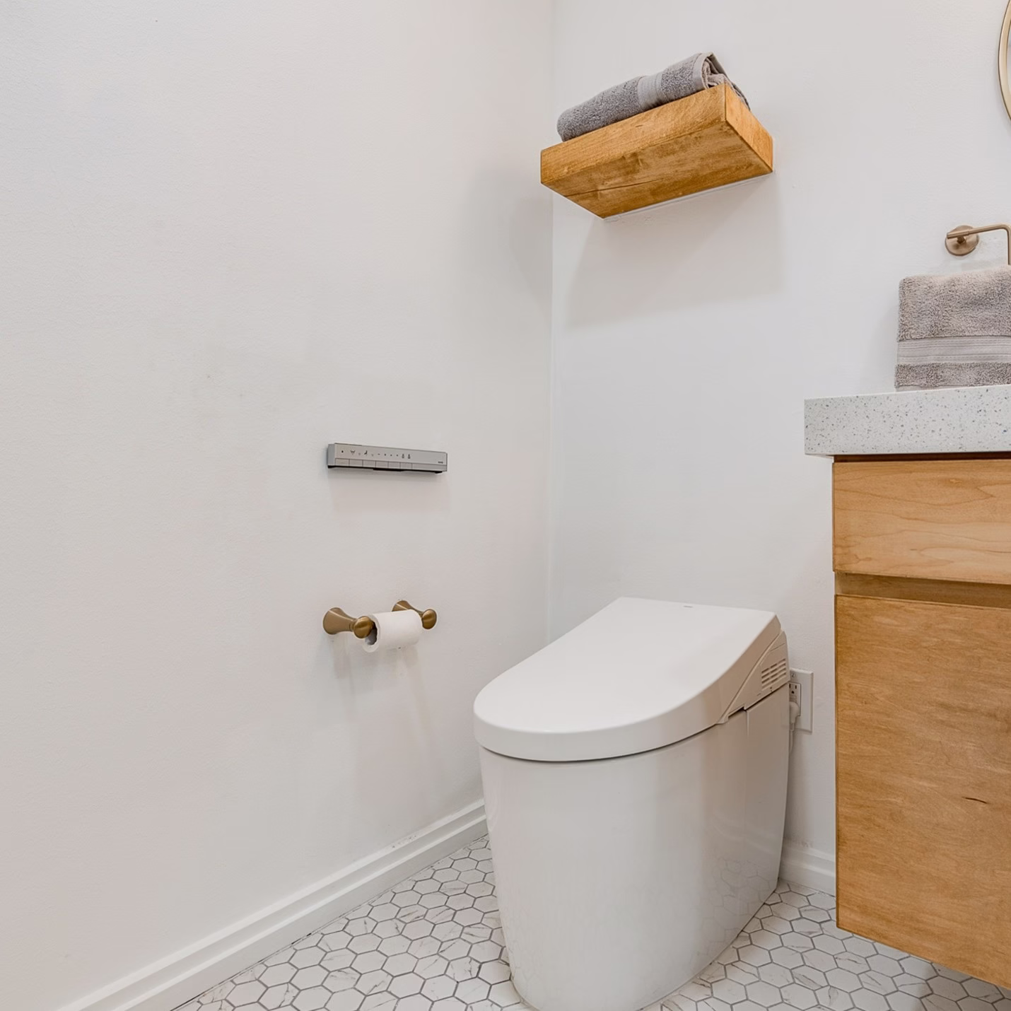 Bathroom Remodel Considerations modern toilet with integrated bidet features and compact layout for efficient use of space
