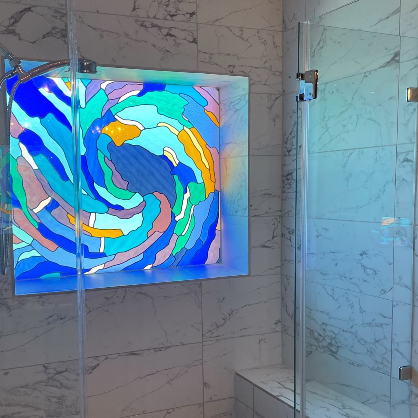 Bathroom Remodel Considerations custom stained glass shower window providing natural light while maintaining privacy
