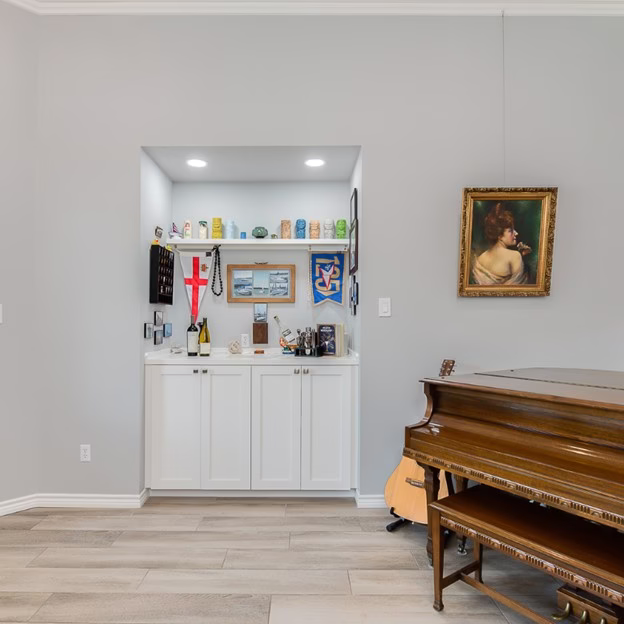 Custom dry bar and built-in storage added during this whole home renovation College Station project to improve functionality and everyday use