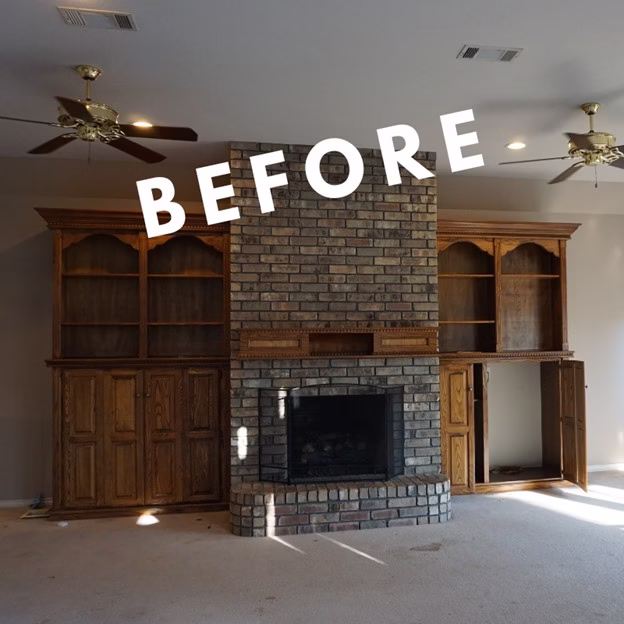 Living room before remodeling with oversized built-ins and dark brick fireplace prior to the modern whole home renovation in Southwood Valley