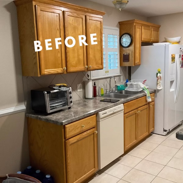 Kitchen before remodel with oak cabinets, laminate countertops, and diagonal tile backsplash in a Bryan, TX home.