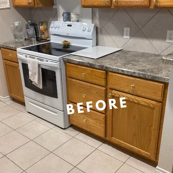 Original kitchen before remodeling with oak cabinetry, white appliances, and dated finishes in the Briarcrest neighborhood.